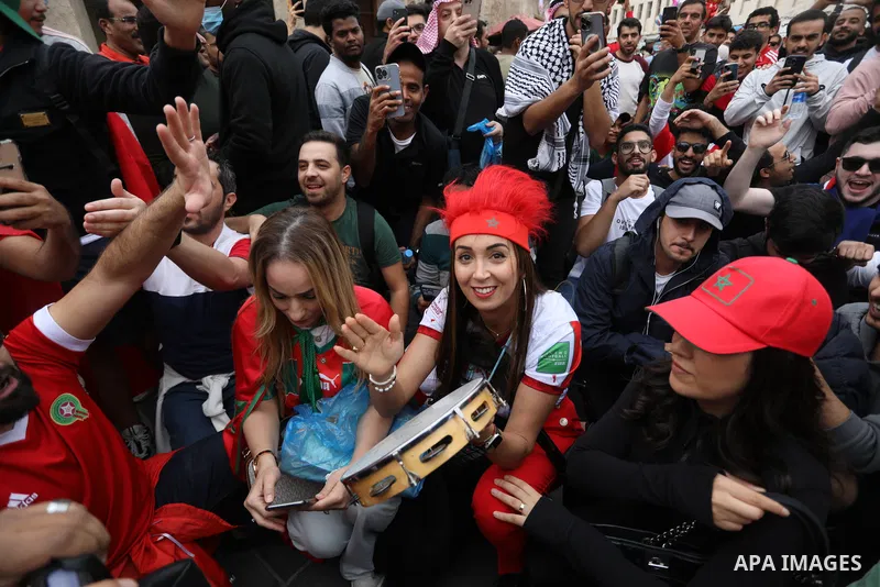 Fans gather in the streets of Doha ahead of the match Morocco vs Portugal in FIFA World Cup, in Doha, Qatar on December 10, 2022. The 2022 FIFA World Cup is an association football tournament, contested by the men's nati...