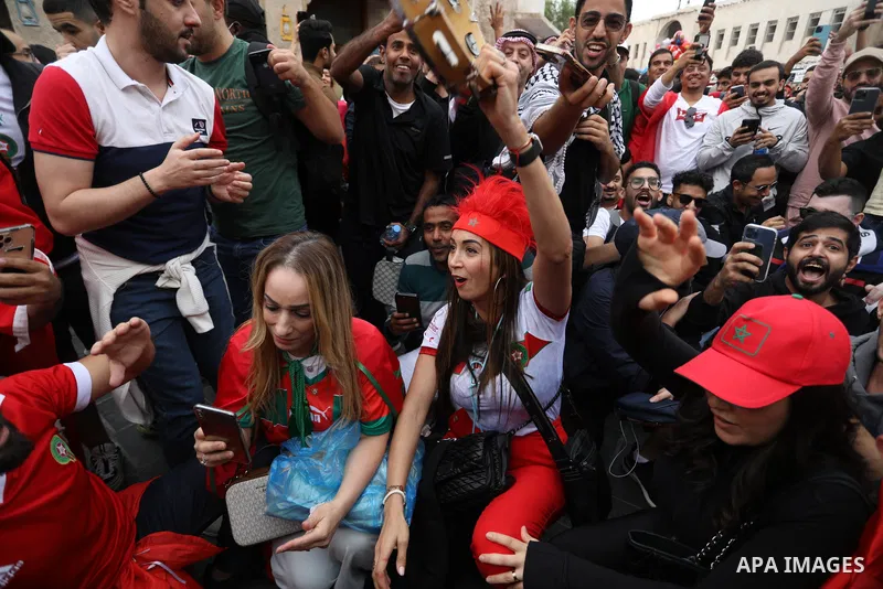 Fans gather in the streets of Doha ahead of the match Morocco vs Portugal in FIFA World Cup, in Doha, Qatar on December 10, 2022. The 2022 FIFA World Cup is an association football tournament, contested by the men's nati...