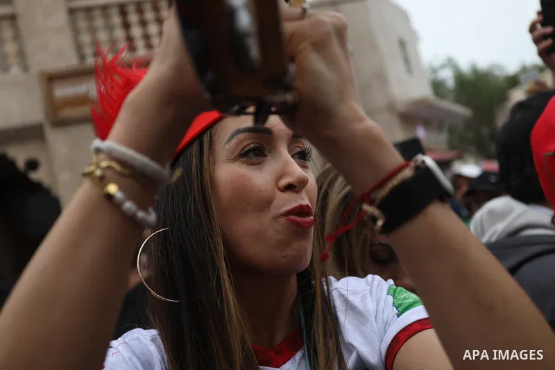 Fans gather in the streets of Doha ahead of the match Morocco vs Portugal in FIFA World Cup, in Doha, Qatar on December 10, 2022. The 2022 FIFA World Cup is an association football tournament, contested by the men's nati...