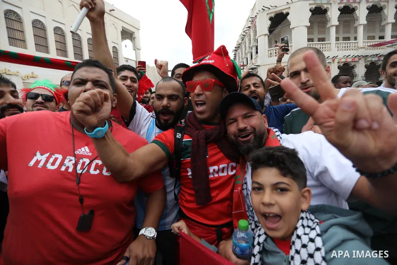 Fans gather in the streets of Doha ahead of the match Morocco vs Portugal in FIFA World Cup, in Doha, Qatar on December 10, 2022. The 2022 FIFA World Cup is an association football tournament, contested by the men's nati...