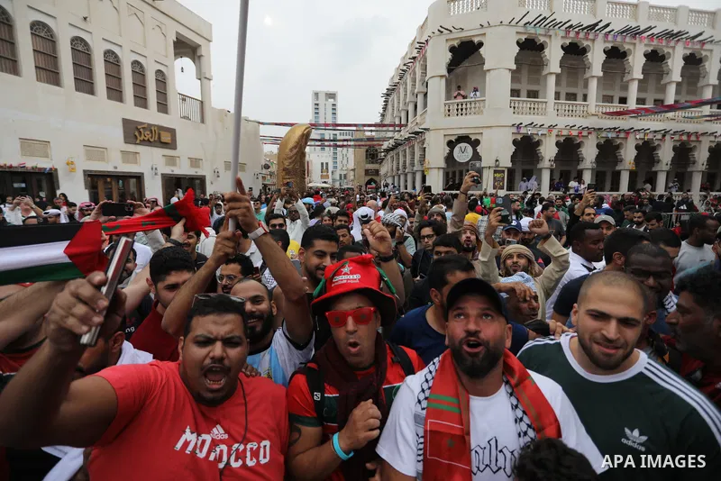 Fans gather in the streets of Doha ahead of the match Morocco vs Portugal in FIFA World Cup, in Doha, Qatar on December 10, 2022. The 2022 FIFA World Cup is an association football tournament, contested by the men's nati...