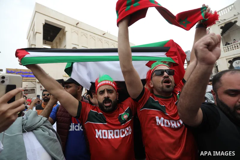 Fans gather in the streets of Doha ahead of the match Morocco vs Portugal in FIFA World Cup, in Doha, Qatar on December 10, 2022. The 2022 FIFA World Cup is an association football tournament, contested by the men's nati...