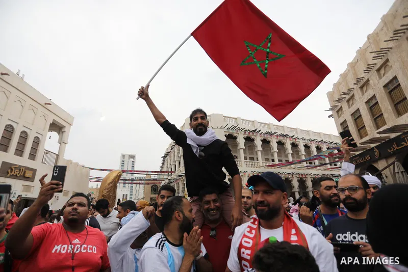 Fans gather in the streets of Doha ahead of the match Morocco vs Portugal in FIFA World Cup, in Doha, Qatar on December 10, 2022. The 2022 FIFA World Cup is an association football tournament, contested by the men's nati...