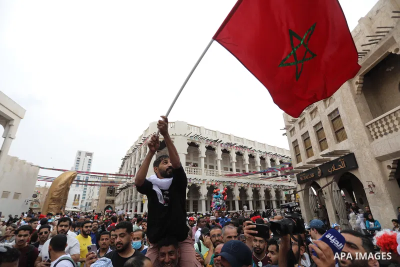 Fans gather in the streets of Doha ahead of the match Morocco vs Portugal in FIFA World Cup, in Doha, Qatar on December 10, 2022. The 2022 FIFA World Cup is an association football tournament, contested by the men's nati...