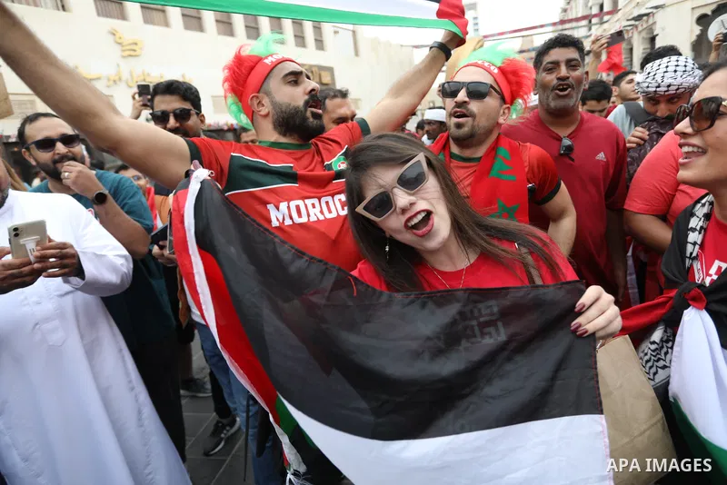 Fans gather in the streets of Doha ahead of the match Morocco vs Portugal in FIFA World Cup, in Doha, Qatar on December 10, 2022. The 2022 FIFA World Cup is an association football tournament, contested by the men's nati...