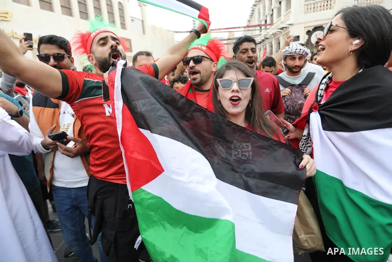 Fans gather in the streets of Doha ahead of the match Morocco vs Portugal in FIFA World Cup, in Doha, Qatar on December 10, 2022. The 2022 FIFA World Cup is an association football tournament, contested by the men's nati...