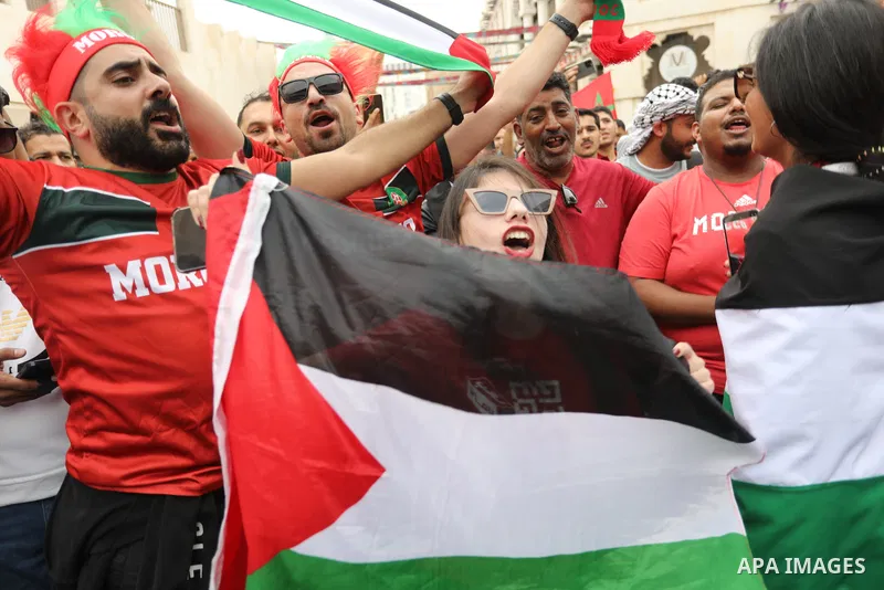 Fans gather in the streets of Doha ahead of the match Morocco vs Portugal in FIFA World Cup, in Doha, Qatar on December 10, 2022. The 2022 FIFA World Cup is an association football tournament, contested by the men's nati...