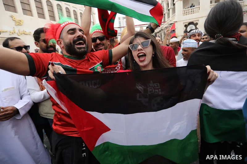 Fans gather in the streets of Doha ahead of the match Morocco vs Portugal in FIFA World Cup, in Doha, Qatar on December 10, 2022. The 2022 FIFA World Cup is an association football tournament, contested by the men's nati...