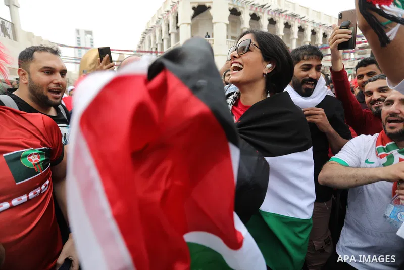 Fans gather in the streets of Doha ahead of the match Morocco vs Portugal in FIFA World Cup, in Doha, Qatar on December 10, 2022. The 2022 FIFA World Cup is an association football tournament, contested by the men's nati...