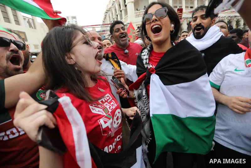 Fans gather in the streets of Doha ahead of the match Morocco vs Portugal in FIFA World Cup, in Doha, Qatar on December 10, 2022. The 2022 FIFA World Cup is an association football tournament, contested by the men's nati...
