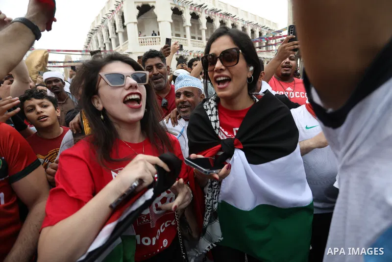 Fans gather in the streets of Doha ahead of the match Morocco vs Portugal in FIFA World Cup, in Doha, Qatar on December 10, 2022. The 2022 FIFA World Cup is an association football tournament, contested by the men's nati...