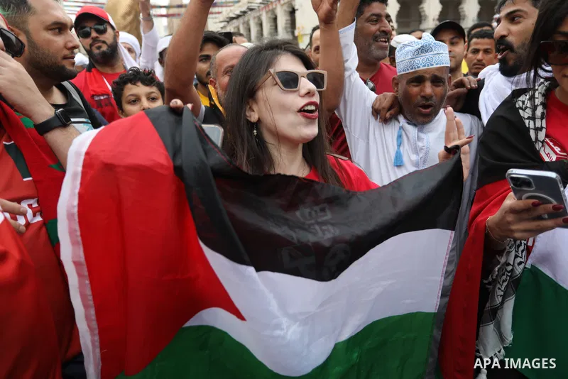 Fans gather in the streets of Doha ahead of the match Morocco vs Portugal in FIFA World Cup, in Doha, Qatar on December 10, 2022. The 2022 FIFA World Cup is an association football tournament, contested by the men's nati...