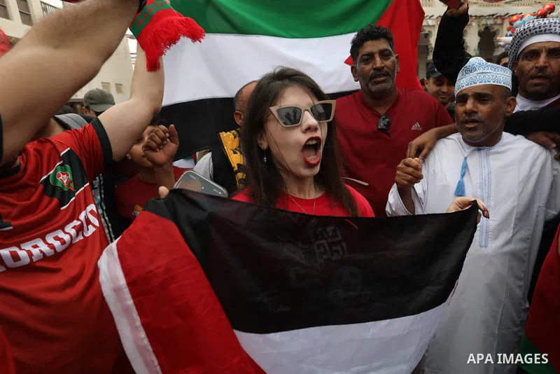 Fans gather in the streets of Doha ahead of the match Morocco vs Portugal in FIFA World Cup, in Doha, Qatar on December 10, 2022. The 2022 FIFA World Cup is an association football tournament, contested by the men's nati...