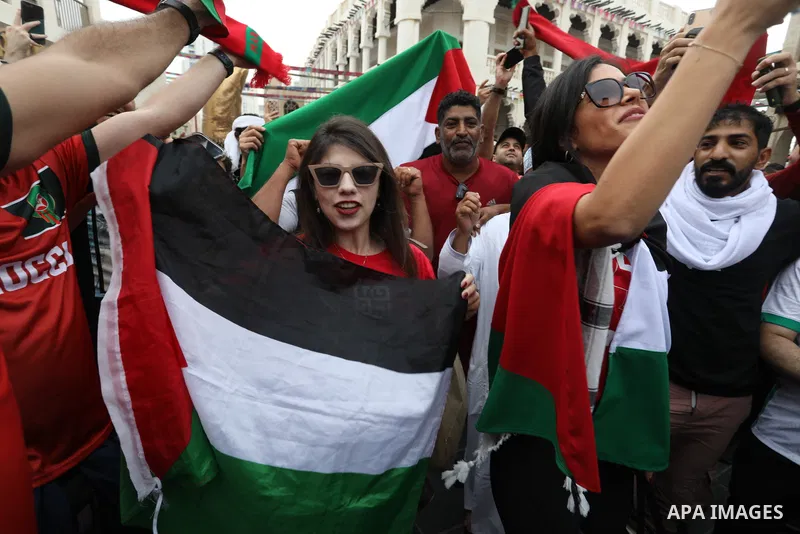 Fans gather in the streets of Doha ahead of the match Morocco vs Portugal in FIFA World Cup, in Doha, Qatar on December 10, 2022. The 2022 FIFA World Cup is an association football tournament, contested by the men's nati...
