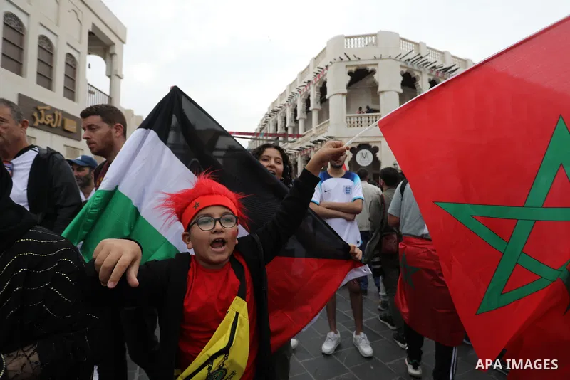 Fans gather in the streets of Doha ahead of the match Morocco vs Portugal in FIFA World Cup, in Doha, Qatar on December 10, 2022. The 2022 FIFA World Cup is an association football tournament, contested by the men's nati...