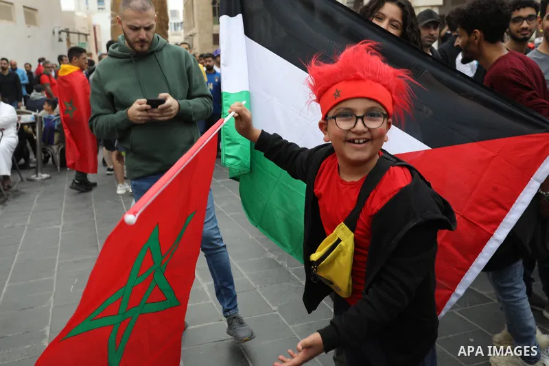 Fans gather in the streets of Doha ahead of the match Morocco vs Portugal in FIFA World Cup, in Doha, Qatar on December 10, 2022. The 2022 FIFA World Cup is an association football tournament, contested by the men's nati...