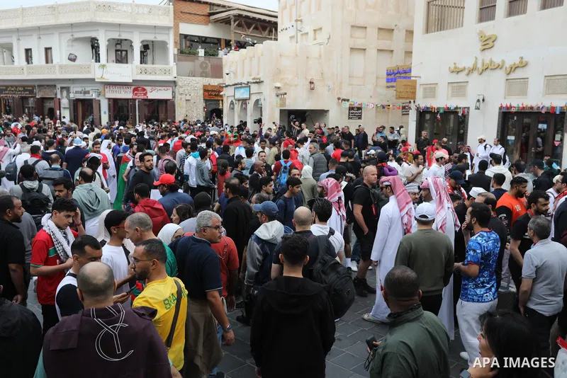 Fans gather in the streets of Doha ahead of the match Morocco vs Portugal in FIFA World Cup, in Doha, Qatar on December 10, 2022. The 2022 FIFA World Cup is an association football tournament, contested by the men's nati...
