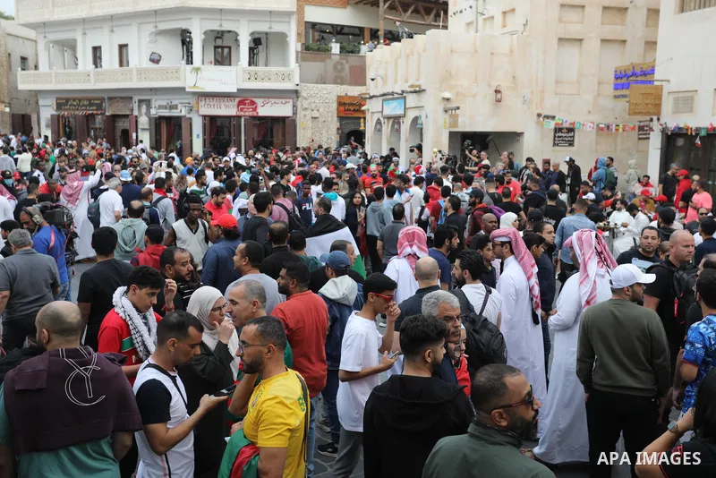 Fans gather in the streets of Doha ahead of the match Morocco vs Portugal in FIFA World Cup, in Doha, Qatar on December 10, 2022. The 2022 FIFA World Cup is an association football tournament, contested by the men's nati...