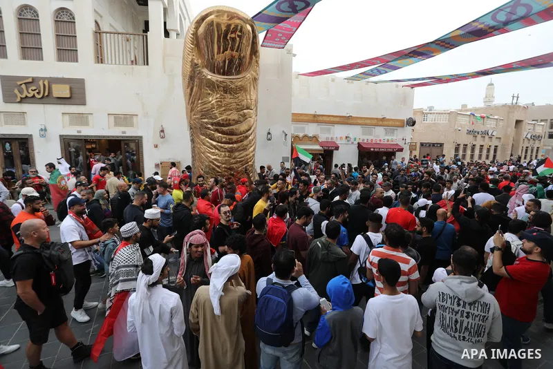 Fans gather in the streets of Doha ahead of the match Morocco vs Portugal in FIFA World Cup, in Doha, Qatar on December 10, 2022. The 2022 FIFA World Cup is an association football tournament, contested by the men's nati...