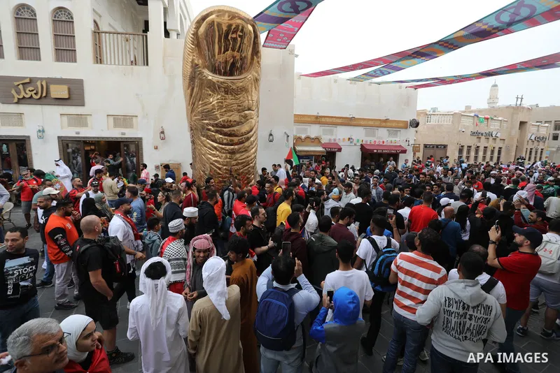 Fans gather in the streets of Doha ahead of the match Morocco vs Portugal in FIFA World Cup, in Doha, Qatar on December 10, 2022. The 2022 FIFA World Cup is an association football tournament, contested by the men's nati...