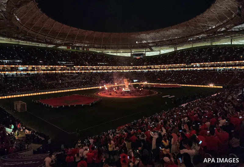 Fans cheer in the stadium during Morocco vs Portugal match in FIFA World Cup, in Doha, Qatar on December 10, 2022. The 2022 FIFA World Cup is an association football tournament, contested by the men's national teams of F...