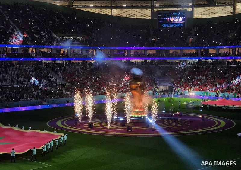 Fans cheer in the stadium during Morocco vs Portugal match in FIFA World Cup, in Doha, Qatar on December 10, 2022. The 2022 FIFA World Cup is an association football tournament, contested by the men's national teams of F...