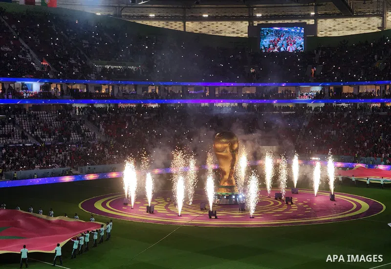 Fans cheer in the stadium during Morocco vs Portugal match in FIFA World Cup, in Doha, Qatar on December 10, 2022. The 2022 FIFA World Cup is an association football tournament, contested by the men's national teams of F...