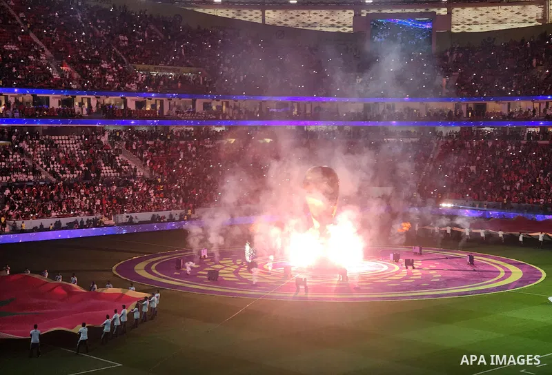 Fans cheer in the stadium during Morocco vs Portugal match in FIFA World Cup, in Doha, Qatar on December 10, 2022. The 2022 FIFA World Cup is an association football tournament, contested by the men's national teams of F...