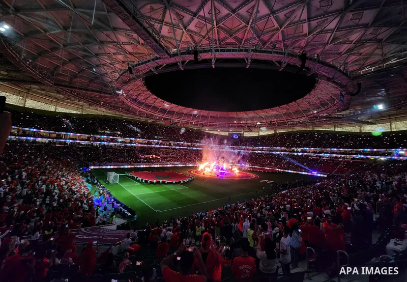 Fans cheer in the stadium during Morocco vs Portugal match in FIFA World Cup, in Doha, Qatar on December 10, 2022. The 2022 FIFA World Cup is an association football tournament, contested by the men's national teams of F...