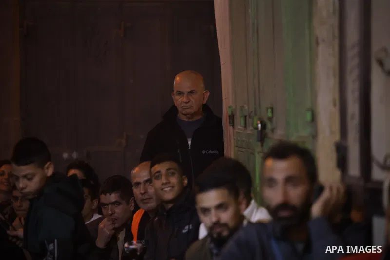 Palestinian fans gather to attend Morocco vs Portugal match in the Bashoura Market, one of the markets in the Old City of Jerusalem on December 10, 2022. Photo by Saeed Qaq\ apaimages
