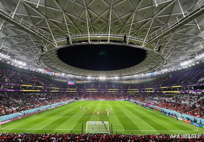 Fans cheer in the stadium during Morocco vs Portugal match in FIFA World Cup, in Doha, Qatar on December 10, 2022. The 2022 FIFA World Cup is an association football tournament, contested by the men's national teams of F...