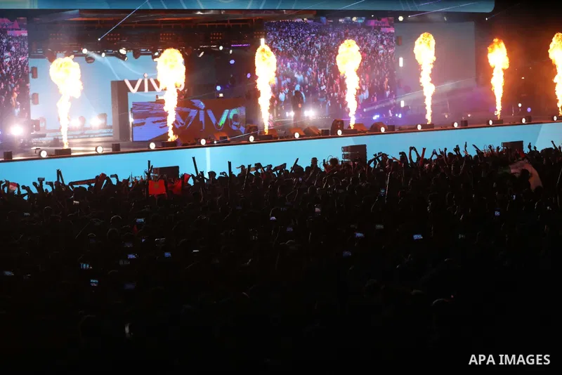 Fans attend on a huge screen the semi-final match between Morocco and France on the Doha Corniche on December 14, 2022. The 2022 FIFA World Cup is an association football tournament, contested by the men's national teams...