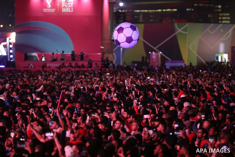Fans attend on a huge screen the semi-final match between Morocco and France on the Doha Corniche on December 14, 2022. The 2022 FIFA World Cup is an association football tournament, contested by the men's national teams...