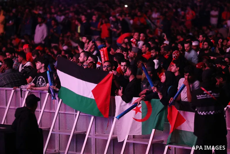 Fans attend on a huge screen the semi-final match between Morocco and France on the Doha Corniche on December 14, 2022. The 2022 FIFA World Cup is an association football tournament, contested by the men's national teams...