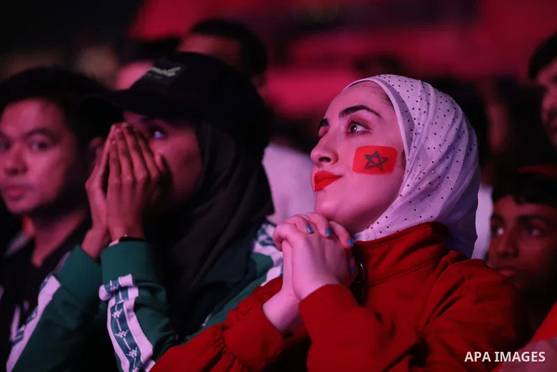 Fans attend on a huge screen the semi-final match between Morocco and France on the Doha Corniche on December 14, 2022. The 2022 FIFA World Cup is an association football tournament, contested by the men's national teams...