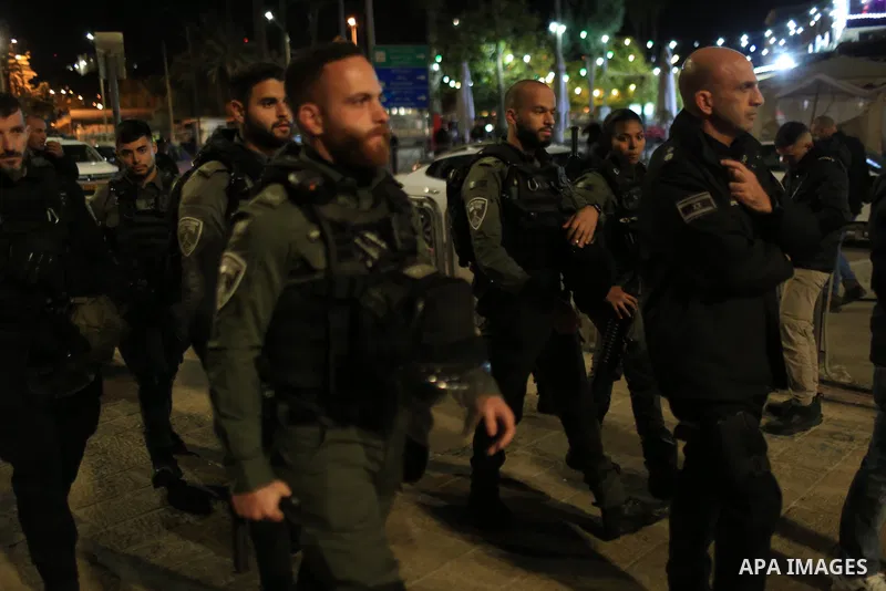 Israeli forces take measures as Palestinian fans gather at the Damascus Gate of the Old City (Bab al-Amud) to show their support for Morocco during the FIFA World Cup Qatar 2022 semi-final match between France and Morocc...