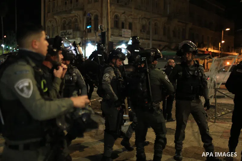 Israeli forces take measures as Palestinian fans gather at the Damascus Gate of the Old City (Bab al-Amud) to show their support for Morocco during the FIFA World Cup Qatar 2022 semi-final match between France and Morocc...
