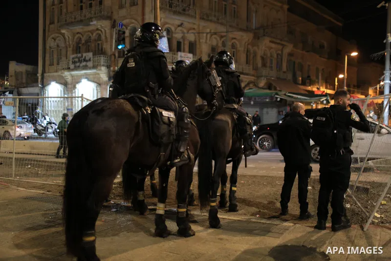 Israeli forces take measures as Palestinian fans gather at the Damascus Gate of the Old City (Bab al-Amud) to show their support for Morocco during the FIFA World Cup Qatar 2022 semi-final match between France and Morocc...