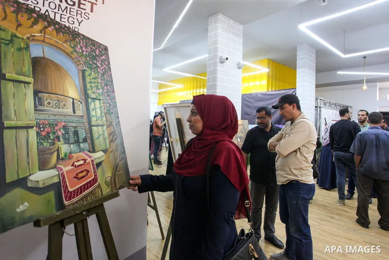 Palestinian Palestinians take part in an art exhibition on the 105th anniversary of the Balfour Declaration in Gaza city on November 3, 2022. 105 years ago the then Conservative British Foreign Secretary, Lord Arthur Bal...