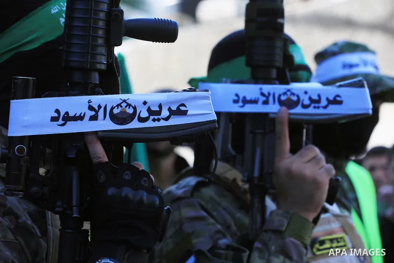 Palestinian Hamas movement supporters take part in a protest against Israel and in solidarity with West Bank and Jerusalem, on November 4, 2022, in al-Bureij in the center of Gaza strip. Tension has been mounting between...
