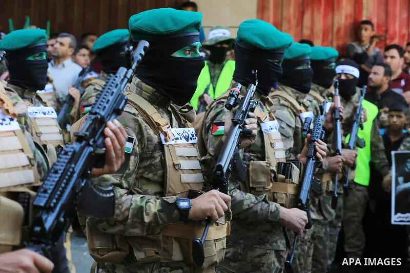 Palestinian Hamas movement supporters take part in a protest against Israel and in solidarity with West Bank and Jerusalem, on November 4, 2022, in al-Bureij in the center of Gaza strip. Tension has been mounting between...