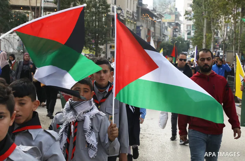 Palestinian supporters of Fatah movement attends the festival marking the 18th anniversary of the death of the late Palestinian President Yasser Arafat, in the West bank city of Ramallah on November 10, 2022. Photo by Wa...
