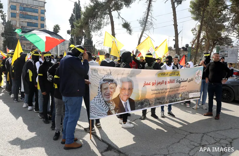 Palestinian supporters of Fatah movement attends the festival marking the 18th anniversary of the death of the late Palestinian President Yasser Arafat, in the West bank city of Ramallah on November 10, 2022. Photo by Wa...