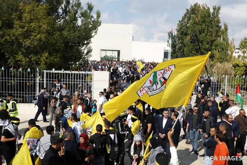 Palestinian supporters of Fatah movement attends the festival marking the 18th anniversary of the death of the late Palestinian President Yasser Arafat, in the West bank city of Ramallah on November 10, 2022. Photo by Wa...