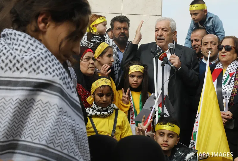 Palestinian supporters of Fatah movement attends the festival marking the 18th anniversary of the death of the late Palestinian President Yasser Arafat, in the West bank city of Ramallah on November 10, 2022. Photo by Wa...