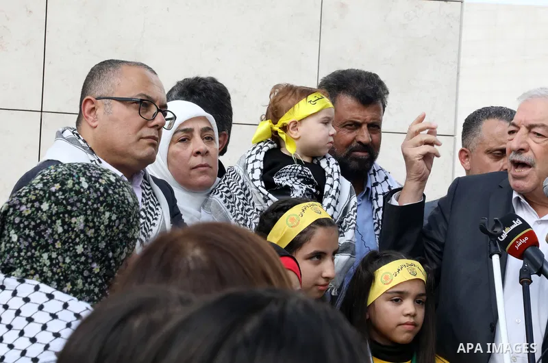 Palestinian supporters of Fatah movement attends the festival marking the 18th anniversary of the death of the late Palestinian President Yasser Arafat, in the West bank city of Ramallah on November 10, 2022. Photo by Wa...