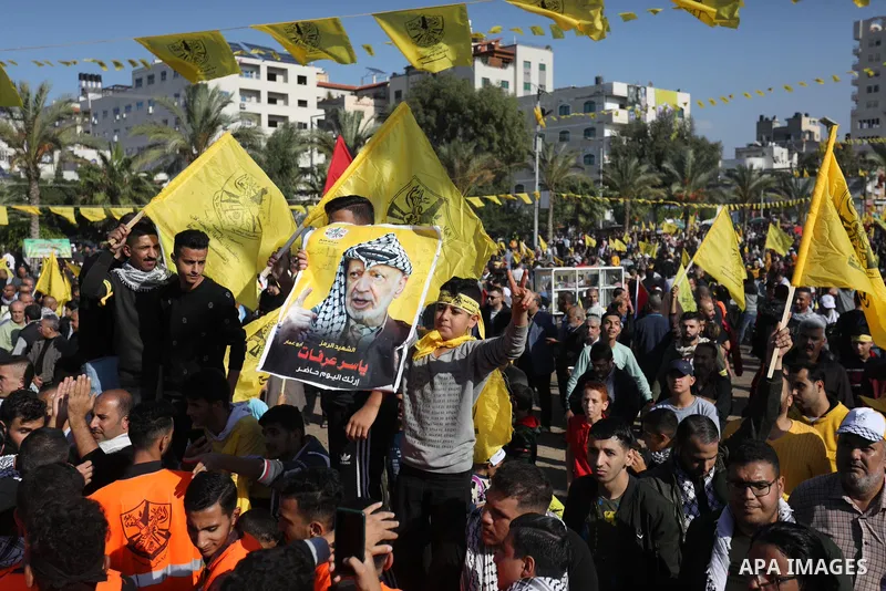 Palestinian supporters of Fatah movement attends the festival marking the 18th anniversary of the death of the late Palestinian President Yasser Arafat, in Gaza city on November 10, 2022. Arafat, also known as Abu Ammar...