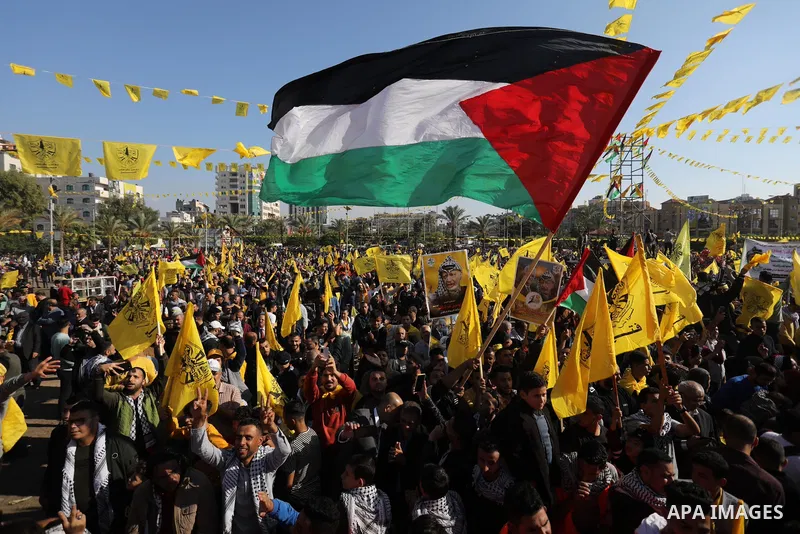 Palestinian supporters of Fatah movement attends the festival marking the 18th anniversary of the death of the late Palestinian President Yasser Arafat, in Gaza city on November 10, 2022. Arafat, also known as Abu Ammar...