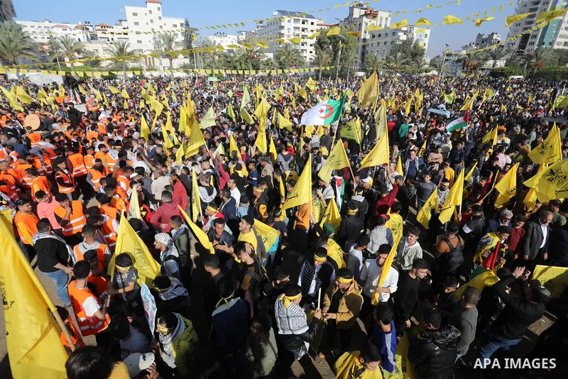 Palestinian supporters of Fatah movement attends the festival marking the 18th anniversary of the death of the late Palestinian President Yasser Arafat, in Gaza city on November 10, 2022. Arafat, also known as Abu Ammar...