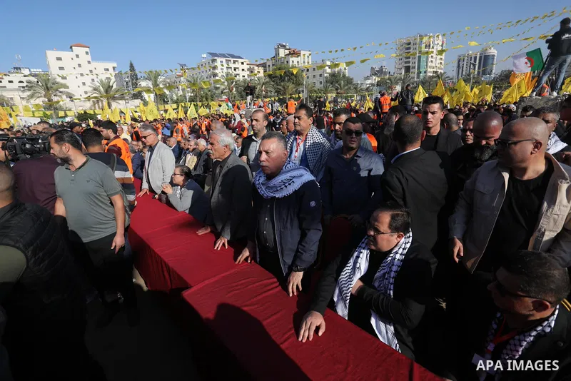 Palestinian supporters of Fatah movement attends the festival marking the 18th anniversary of the death of the late Palestinian President Yasser Arafat, in Gaza city on November 10, 2022. Arafat, also known as Abu Ammar...